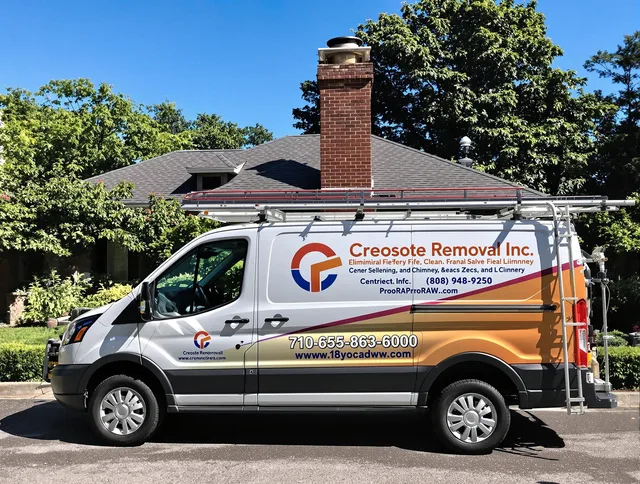 Clearwater Chimney Sweep technician removing creosote safely in Clearwater, FL