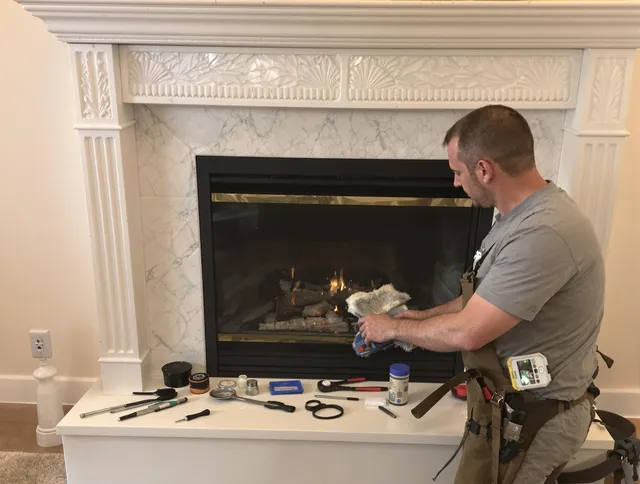 Clearwater Chimney Sweep performing fireplace maintenance in Clearwater, FL
